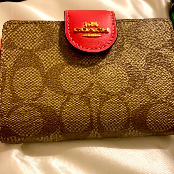 Coach Handbags - Coach wallet, with tags, strawberry color.